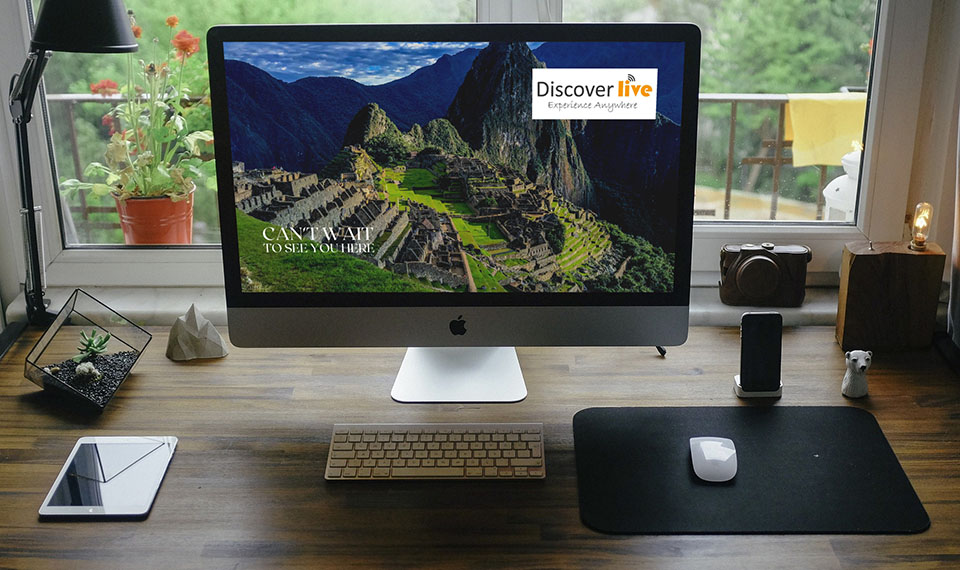 Computer Monitor on desk with Discover Live image on screen